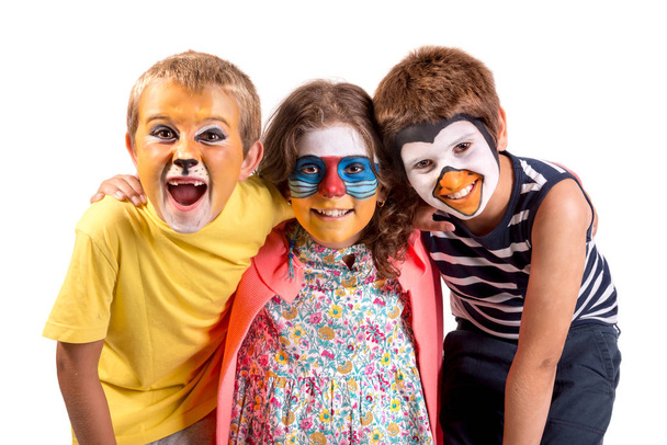 Children's group with animal face-paint isolated in white - Fotó, kép