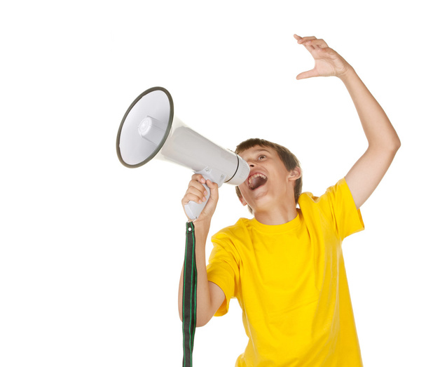 Boy yelling into a megaphone - Zdjęcie, obraz