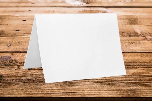 blank paper note on wooden background - Фото, зображення