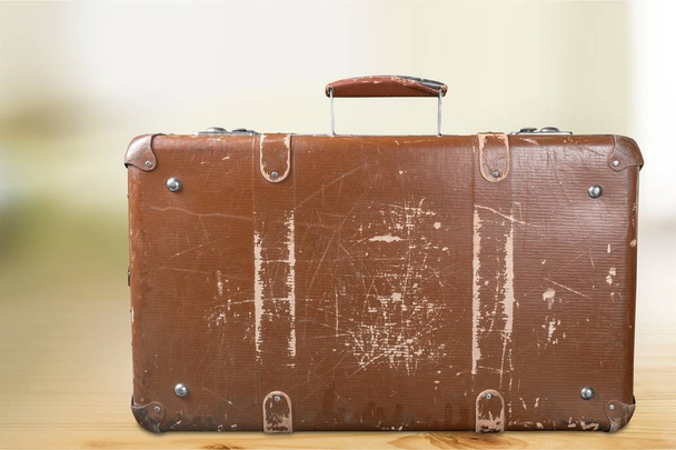 Vintage Suitcase on wooden background , travel concept - Fotoğraf, Görsel