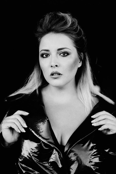 gorgeous young blond woman in leather coat  - Φωτογραφία, εικόνα