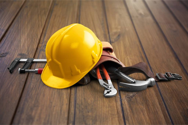 Yellow hard hat and tools, construction concept - Foto, immagini