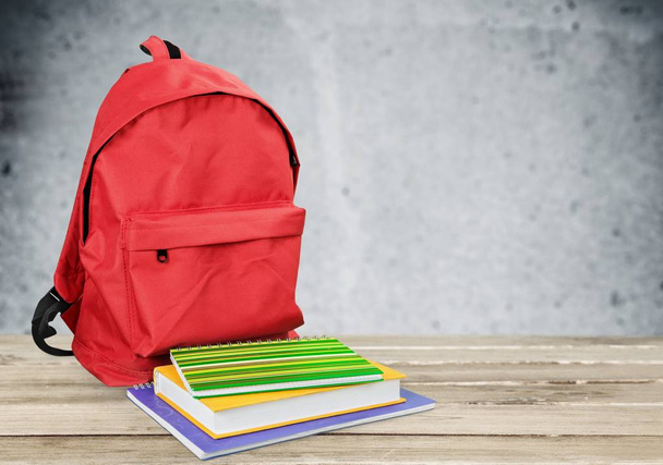 School Backpack with stationery, back to school background - Фото, изображение