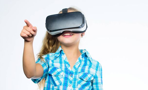 Girl cute child with head mounted display on white background. Virtual education for school pupil. Get virtual experience. Virtual reality concept. Kid explore modern technology virtual reality - Foto, Imagen