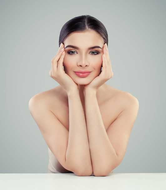 Cheerful woman with healthy skin and cute face. Spa, wellness and skincare concept - Photo, Image