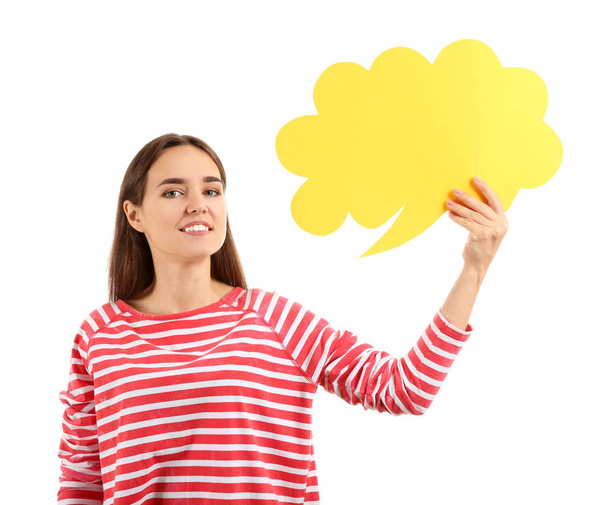 Young woman with blank speech bubble on white background - Fotó, kép