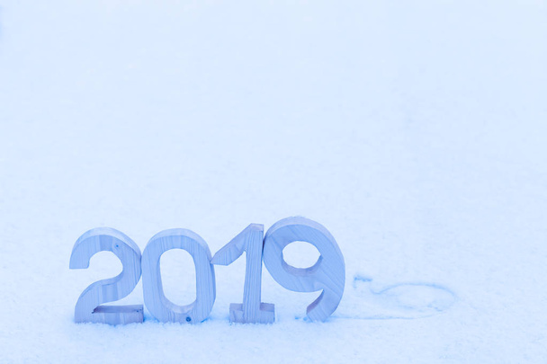 Figures 2019 on the snow. New year and christmas theme. Toned. - Photo, image