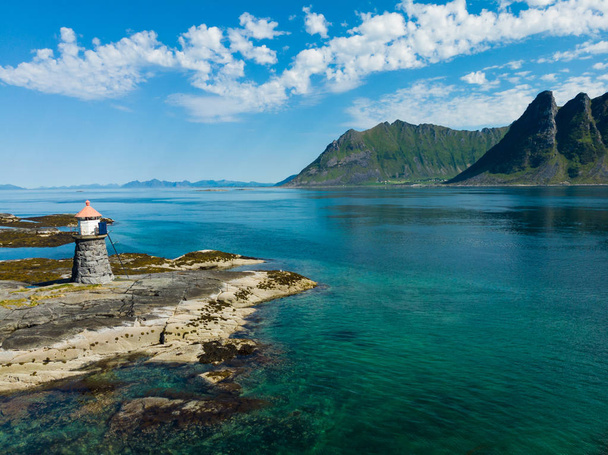 Seascape on Lofoten islands with Gimsoysand lighthouse, Gimsoya island, Nordland county Norway. - Fotó, kép