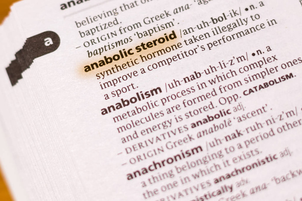The word or phrase Anabolic Steroid in a dictionary highlighted with marker. - Photo, Image
