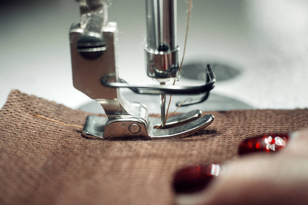 The sewing machine and item of clothing - Фото, изображение