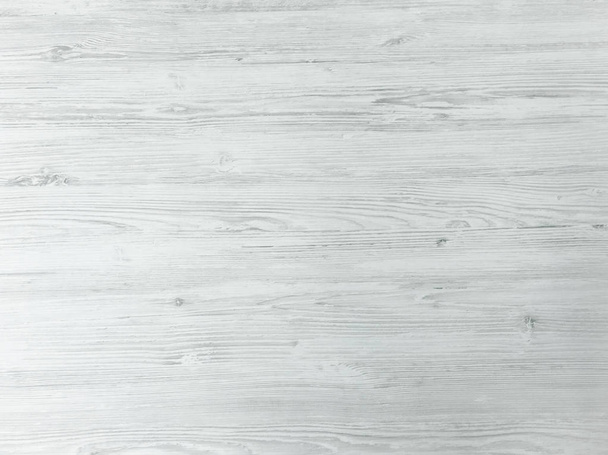 houtstructuur achtergrond, verweerde licht rustiek eiken. verschoten houten gelakte witte verf tonen woodgrain textuur. hardhout planken patroon tabel bovenaanzicht gewassen - Foto, afbeelding