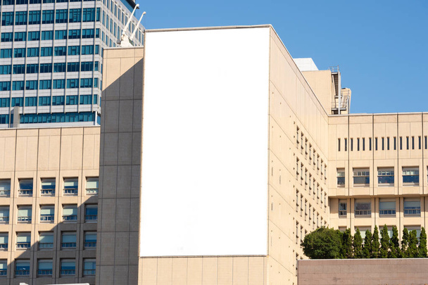 Large blank billboard on a street wall, banners with room to add your own text - Photo, Image