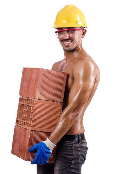 Constructor muscular con ladrillos en blanco
 - Foto, Imagen