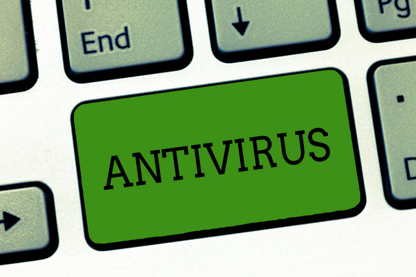 Conceptual hand writing showing Antivirus. Business photo showcasing software designed to detect and destroy computer viruses Keyboard Intention to create computer message keypad idea. - Photo, Image