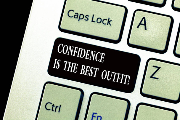 Word writing text Confidence Is The Best Outfit. Business concept for Selfesteem looks better in you than clothes Keyboard key Intention to create computer message, pressing keypad idea. - Photo, Image