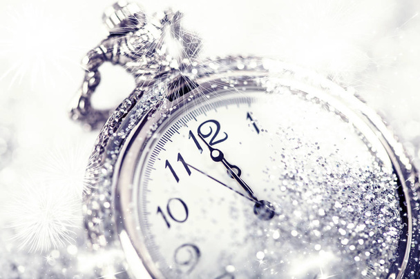 New Year's at midnight - Old clock with stars snowflakes and holiday lights - Foto, Bild