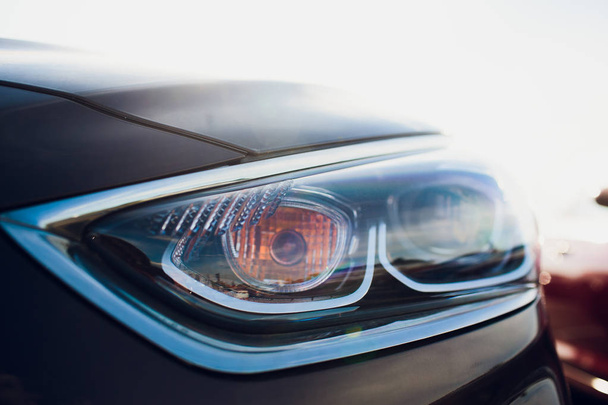 Car headlight with shallow depth field - Фото, зображення