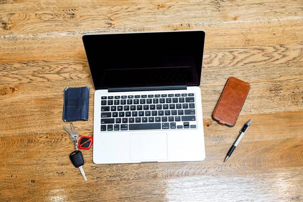 Laptop and other accessories on the desk - Zdjęcie, obraz
