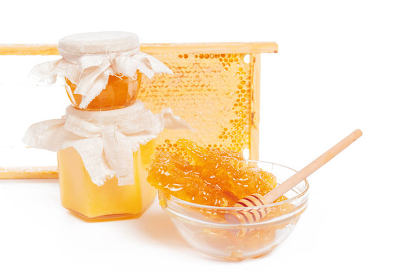jar of honey and stick isolated on white background - Photo, Image