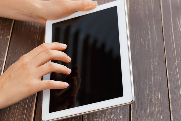 woman holding digital tablet, closeup - Фото, изображение