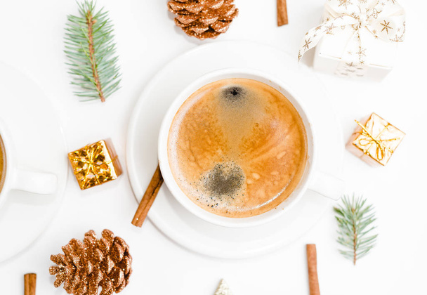 Creative natural layout made of winter things with coffee cup on marble background. Flat lay. - Photo, Image