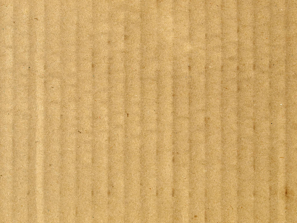 Brown corrugated cardboard sheet background, soft pastel colour - Photo, Image