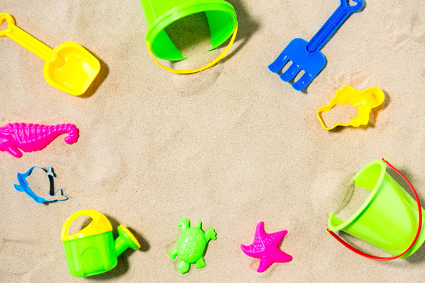 close up of sand toys kit on summer beach - Φωτογραφία, εικόνα