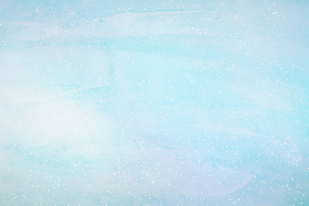 intreepupil abstract blue bokeh achtergrond. Winter met sneeuw. - Foto, afbeelding
