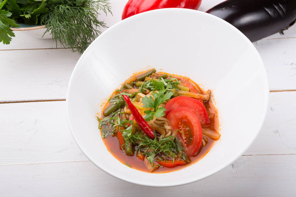 Uzbek traditional lagman noodles soup served with meat - Photo, image