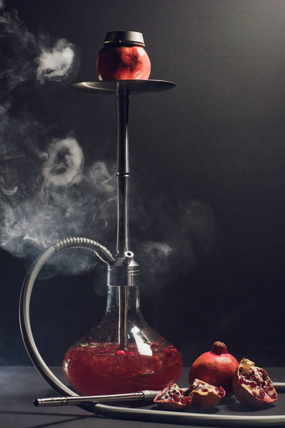 Hookah hot coals on shisha bowl with black background. Stylish oriental shisha. Garnet - Foto, Imagen