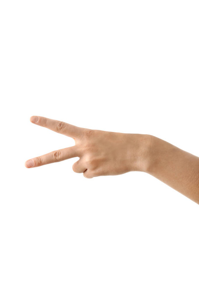 Main féminine montrant deux doigts sur fond blanc
 - Photo, image