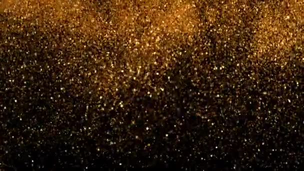 Gouden glitter explosie in super slow motion - Video