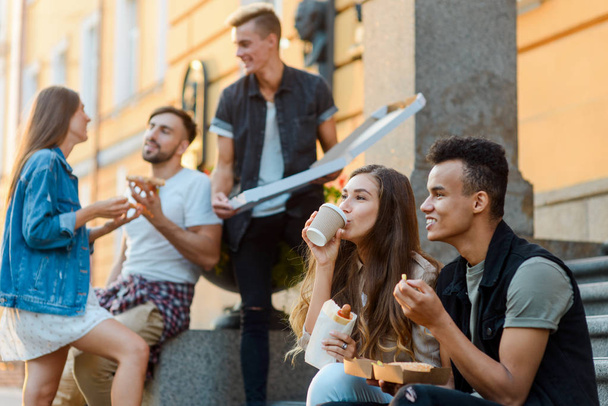 Young people eating junk food - Photo, image
