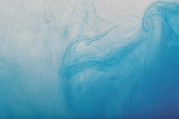background with blue swirls of acrylic paint - Φωτογραφία, εικόνα