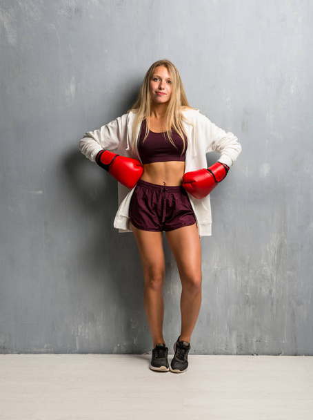 Young sport woman with boxing gloves - Фото, изображение