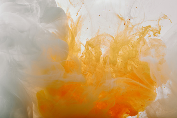 abstract texture with white and orange swirls of paint - Photo, Image