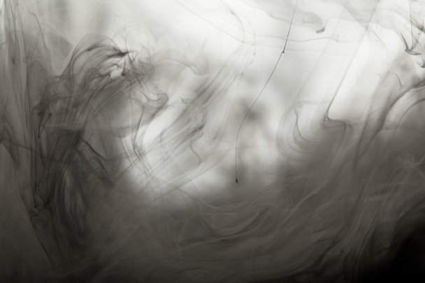 abstract monochrome background with paint swirls - Foto, Imagen