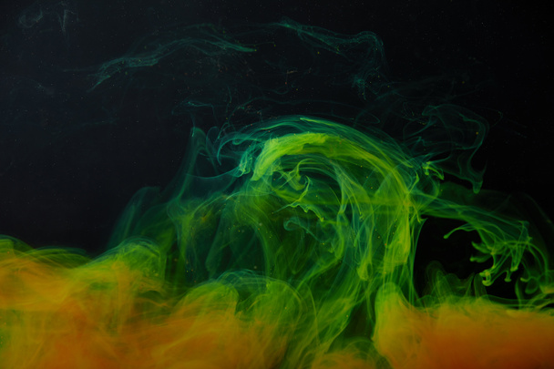 background with abstract green and orange swirls of paint  - Foto, Imagem