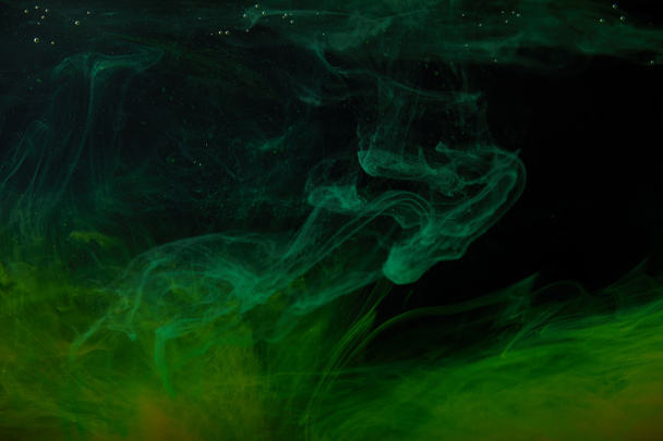 abstract background with green swirls of paint in water - Foto, immagini