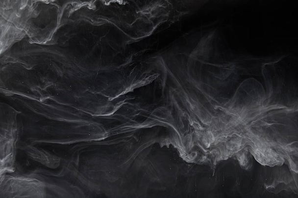abstraktní spirály šedou barvou na černém pozadí - Fotografie, Obrázek