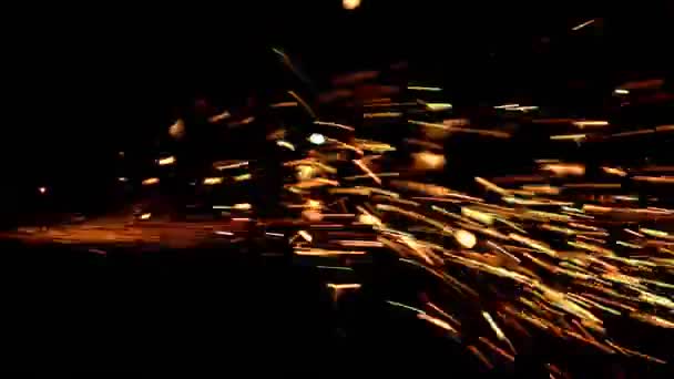 Super slow motion footage of sparks isolated on a black background - Video