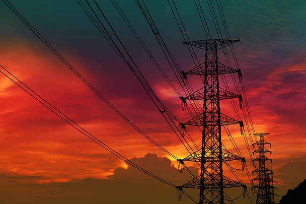silhouette puissance poteau électrique et ligne électrique et ciel couchant coloré
 - Photo, image