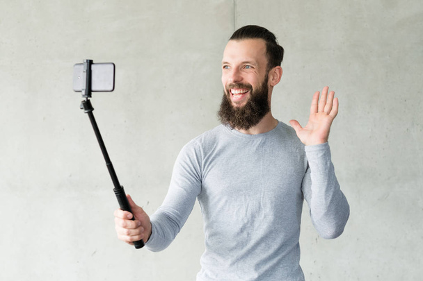 blogger camera man selfie phone monopod video - Fotó, kép