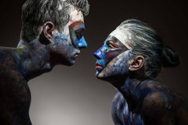 Portrait of a color faces art of couple in love - Zdjęcie, obraz
