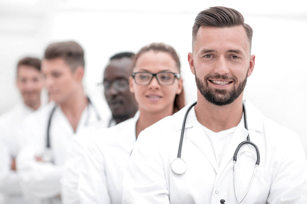 Team of young professional doctors standing together in laboratory, posing with arms crossed - Photo, Image