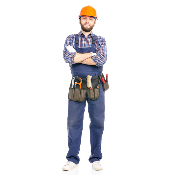 Young man builder with toolbelt industry worker hardhat - Fotoğraf, Görsel