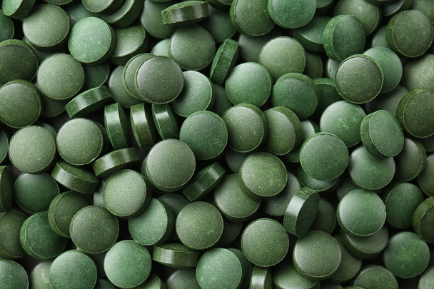 Spirulina tablets, top view - Fotoğraf, Görsel