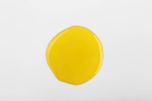 Drop of oil on white background - Photo, Image
