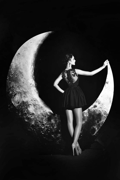 Woman in dress on moon - Fotoğraf, Görsel