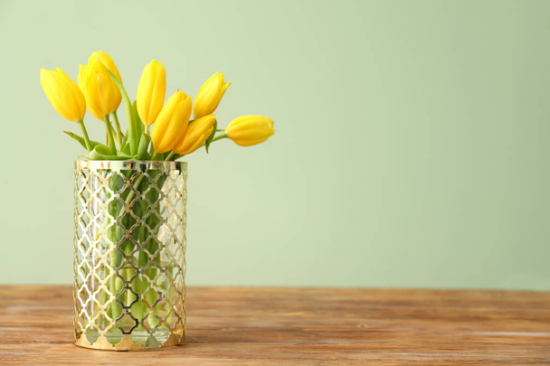 Vase with beautiful tulips on wooden table - Фото, зображення